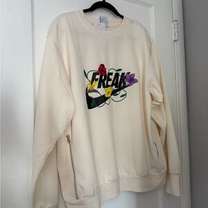 Nike Cream Sweatshirt with Purple Floral Design
